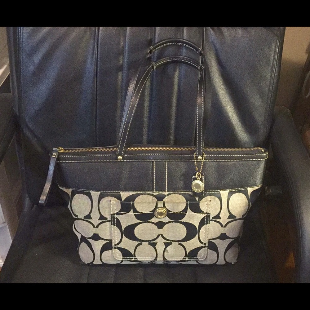 Signature Coach Handbag... New Condition